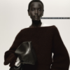 Captura de pantalla 2025-11-24 183148 Suéter oversized con cuello de ojal